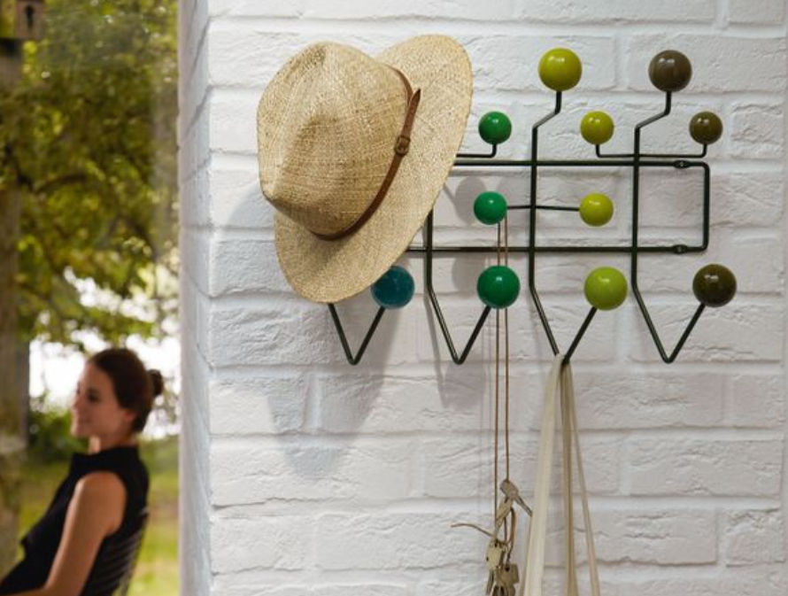 Hang It All is a designer coat stand produced by Vitra, designed by Charles & Ray Eames and offered by Peverelli