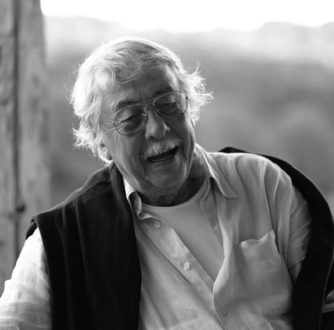 This photo shows the designer of the Uovo lamp by Fontana Arte