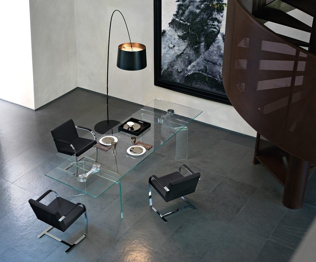 Ray Plus is a dining table designed by Bartoli Design and offered by Peverelli