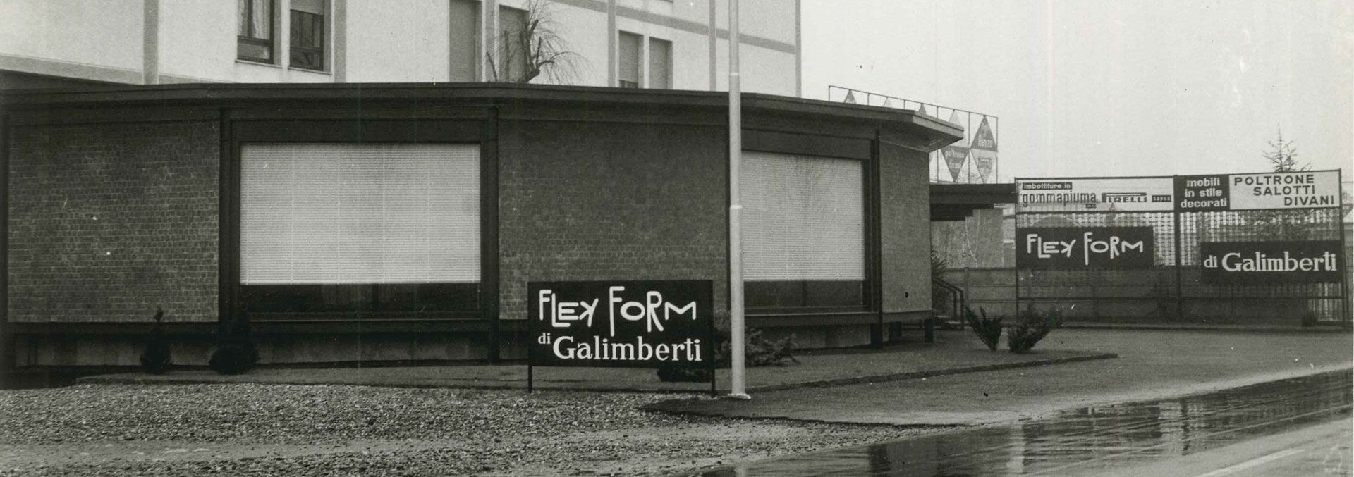 Vintage photo of the exterior of the headquarters of Flexform, a leading manufacturer of luxury furniture, at the beginning of its activity