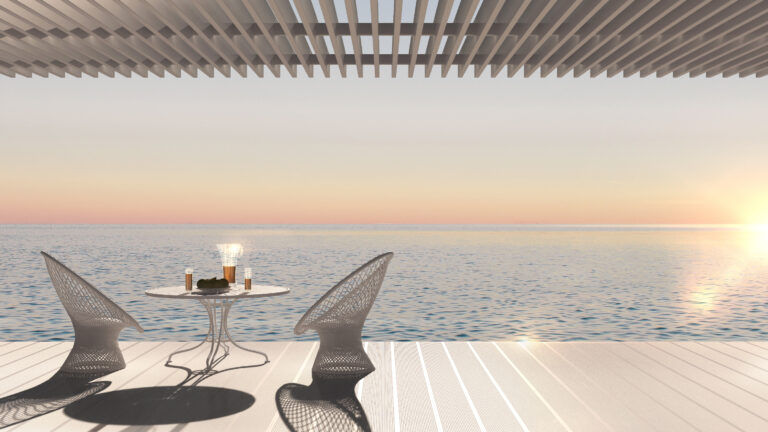 Cette photo montre deux chaises design contemporaines sur une terrasse avec vue sur la mer et le coucher de soleil.