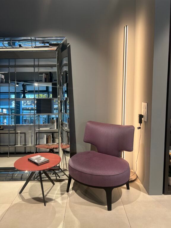 This photo shows the drop chair and Zefiro coffee table by Flexform