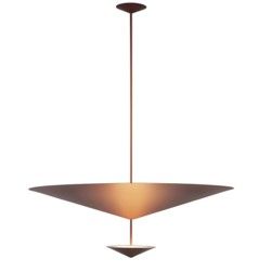 Cette photo montre la lampe suspendue Narciso de Penta.