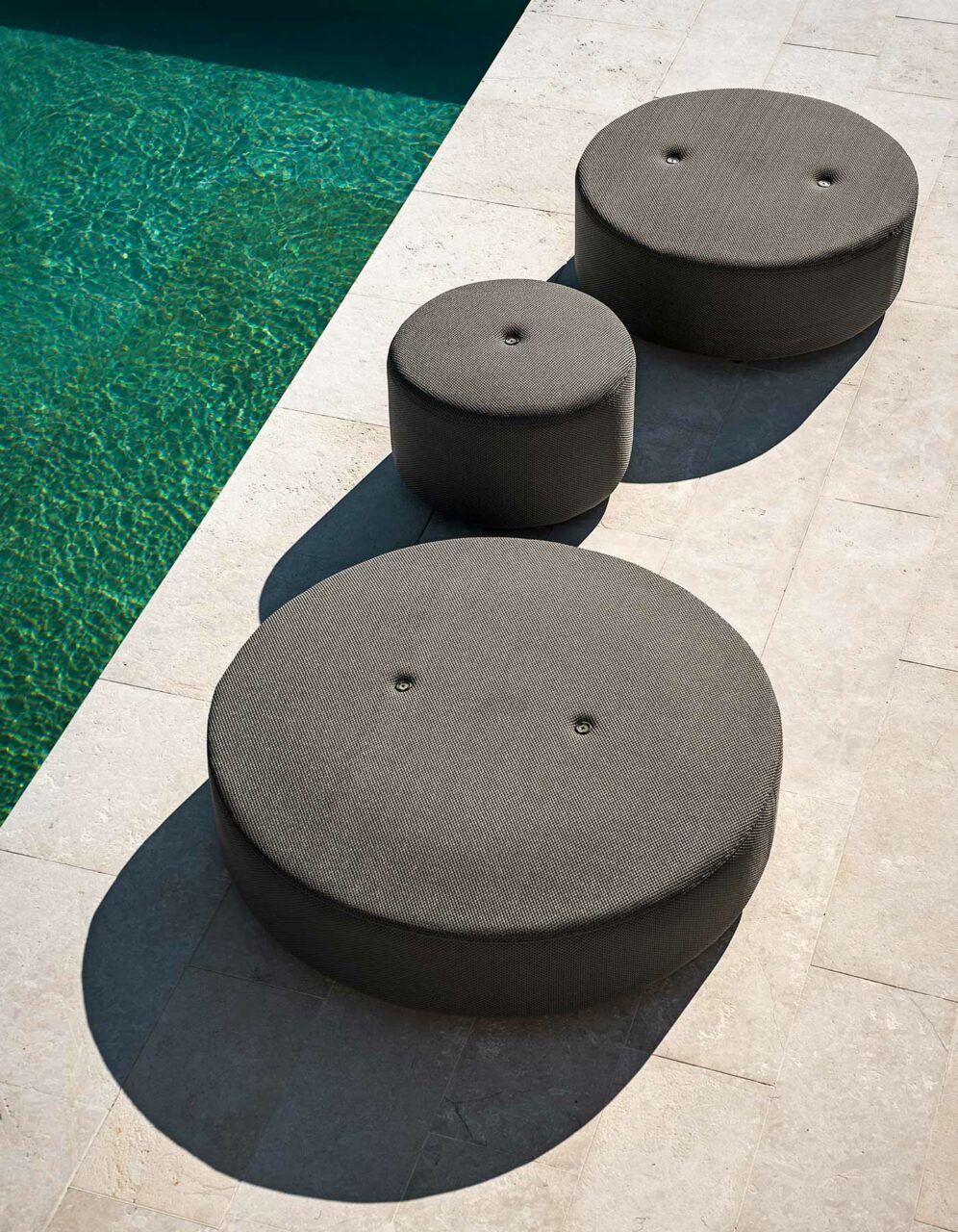This photo shows Double outdoor poufs by RODA