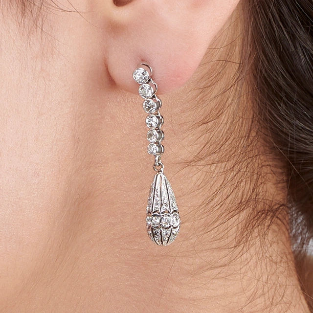 Close up of Art Deco Diamond Pendant Earrings