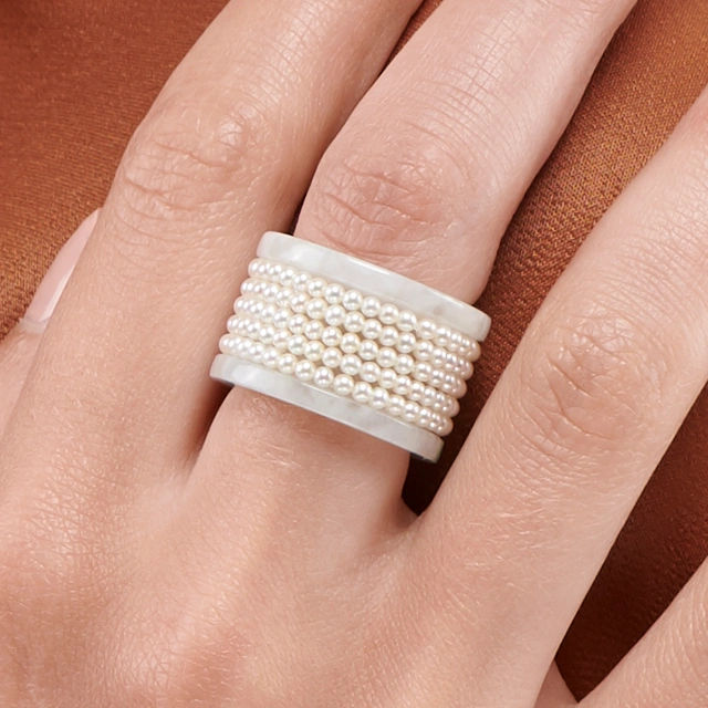 Close up of Blue Lotus Jade Natural Pearl Wide Band