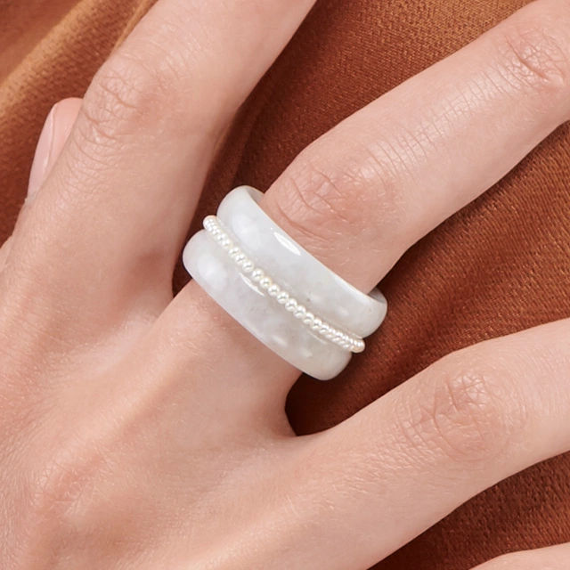 Close up of Blue Lotus White Jade Pearl Wide Band