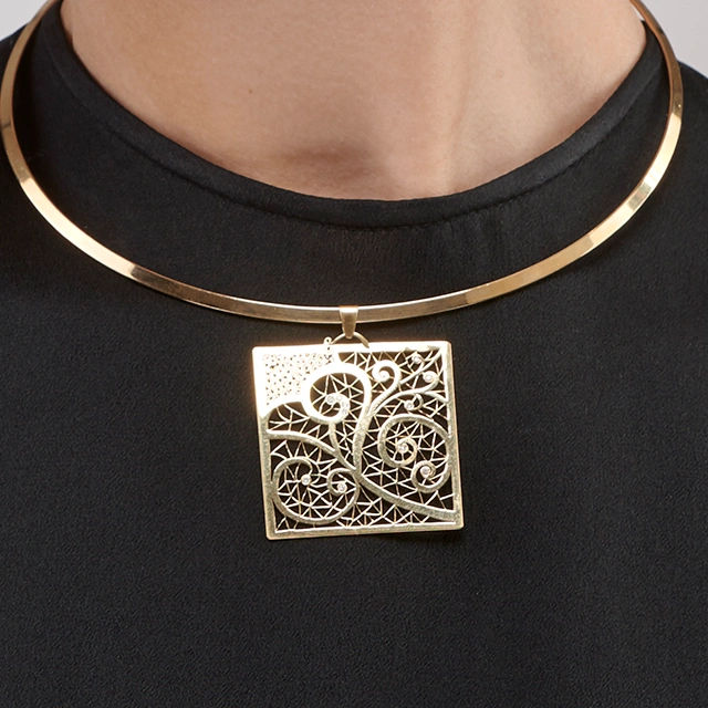 Close up of Diamond Volute Lace Pendant