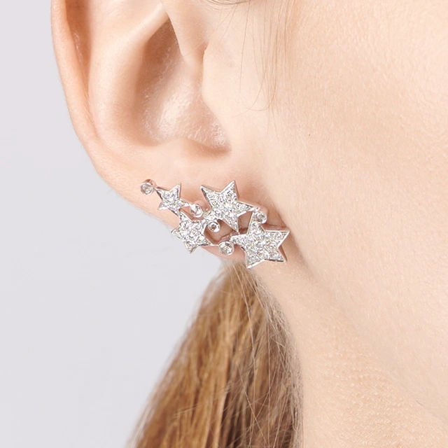 Close up of Make a Wish Transformable Earrings and Ear Cuff