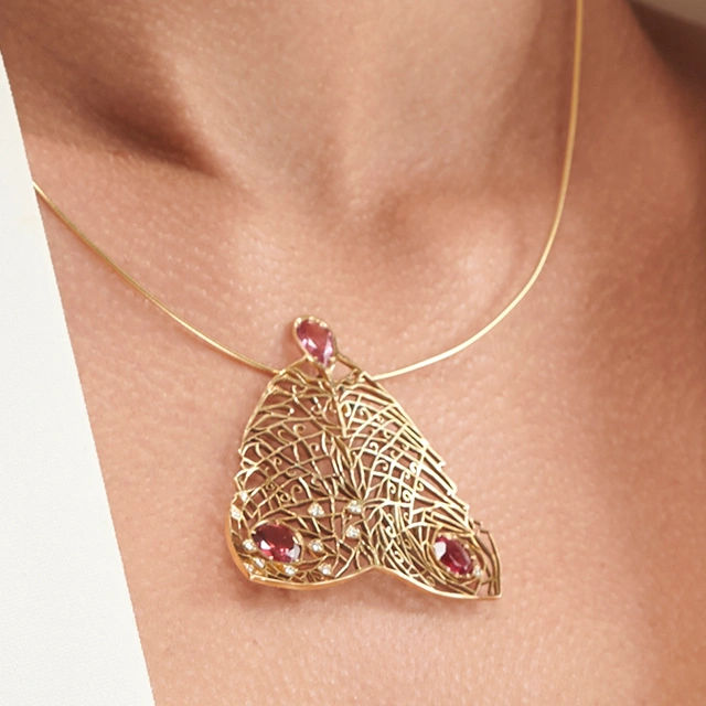 Close up of Pink Tourmaline Butterfly Pendant