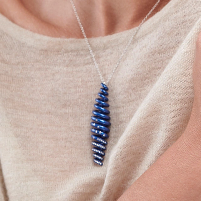Close up of Shooting Star Blue Titanium Pendant