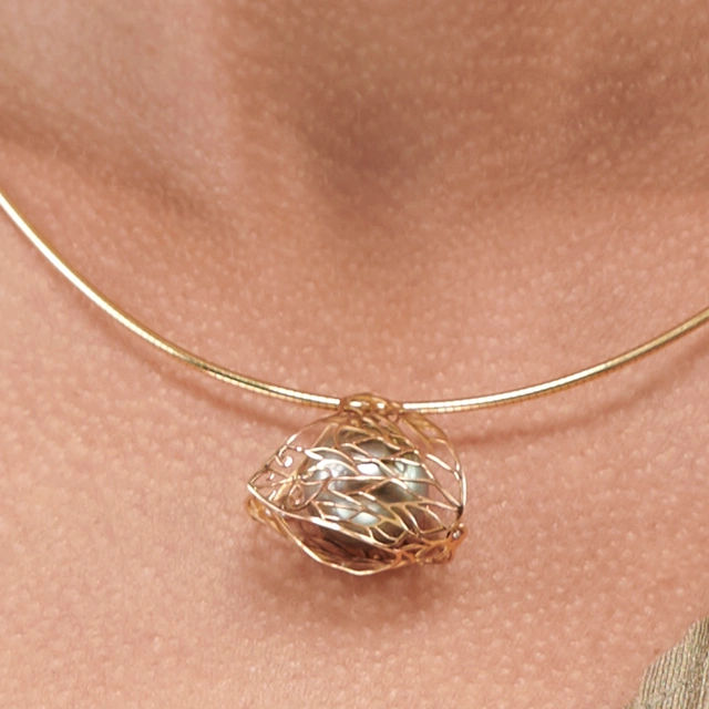 Close up of South Sea Pearl Butterfly Lace Pendant