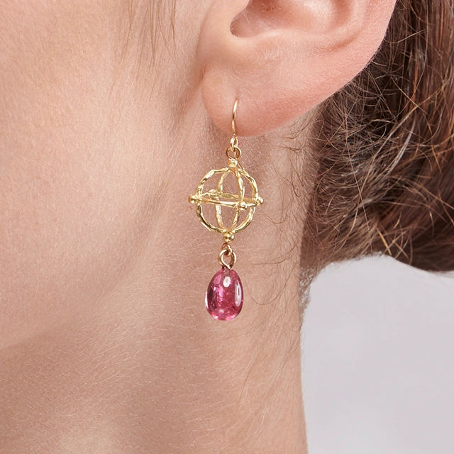 Close up of Tourmaline Astrolabe Earrings