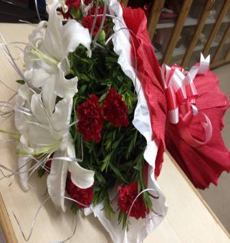 lilies and red carnation bunch