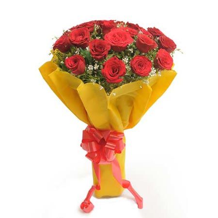 20 Red Roses in Yellow Paper Packing