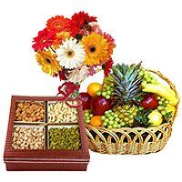 Bunch of 12 Mix Gerberas with 3 kg Fresh fruit Basket and Half kg Mixed Dry fruits