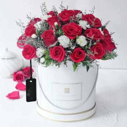 20 Red Roses and 10 White Carnations Arrangement