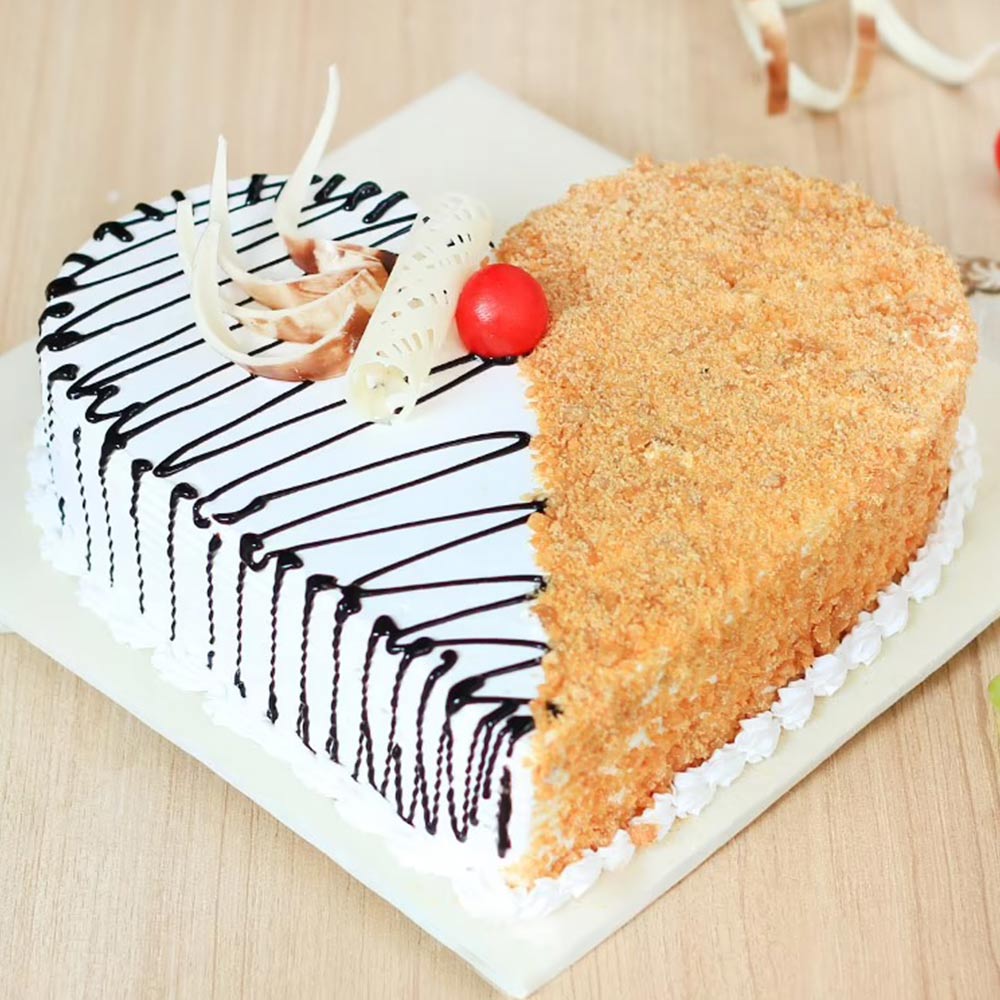 Heart Shaped Butterscotch Cake With White Chocolate N Red Cherry