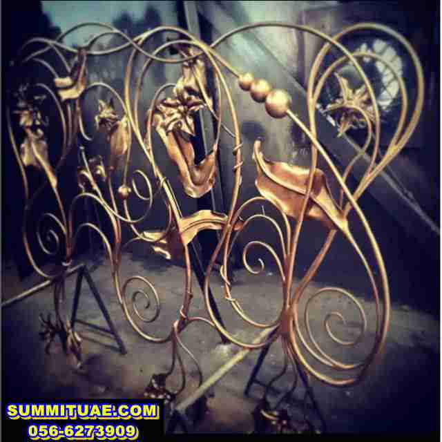 Forged Metalwork Accents Shape Interior Railing Display