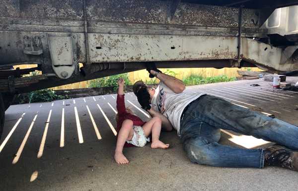 Kids love climbing on the truck and helping daddy work on it