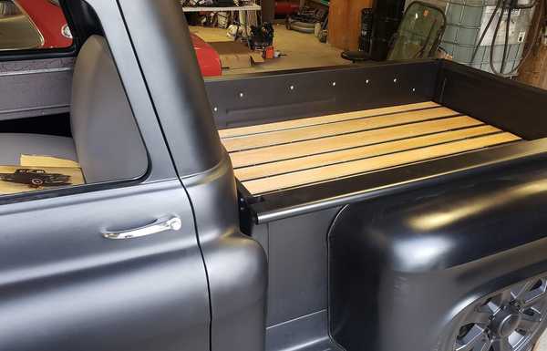 Power lift bed