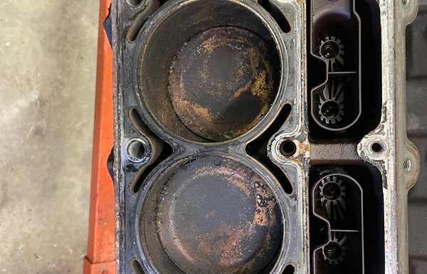 Whoops! So I was starting to rush and was cleaning the intake surface on the heads and knocked a bunch of crud into The Valley and onto the cam… guess I’ll be taking it apart and cleaning it out… just as long as I don’t look at the cam bearings right? Whoops! So I was starting to rush and was cleaning the intake surface on the heads and knocked a bunch of crud into The Valley and onto the cam… guess I’ll be taking it apart and cleaning it out… just as long as I don’t look at the cam bearings right?