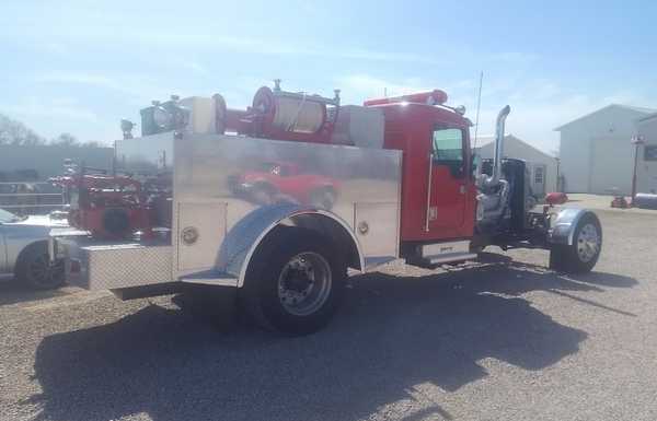 Wheels and tires are off of a semi.