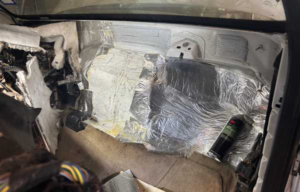 Extra insulation. I wasn't able to add more to the center, since I moved the firewall back about 2" or so. The 6.4l engine had a screaming hot turbo right outside the center section, and a HVAC box on the inside. With the Cuummins, all the heat is on the right side.
I was able to fit the standard Ford insulation back in the middle, so there is some there. Extra insulation. I wasn't able to add more to the center, since I moved the firewall back about 2" or so. The 6.4l engine had a screaming hot turbo right outside the center section, and a HVAC box on the inside. With the Cuummins, all the heat is on the right side.
I was able to fit the standard Ford insulation back in the middle, so there is some there.