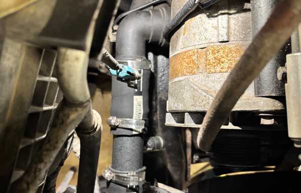 The lower hose was super simple. I used a Ford 90' quick connect. The lower hose was super simple. I used a Ford 90' quick connect.