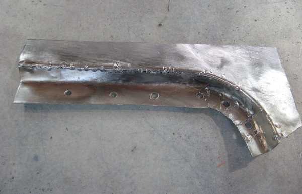 Rebuilding a rear fender lip. Rebuilding a rear fender lip.