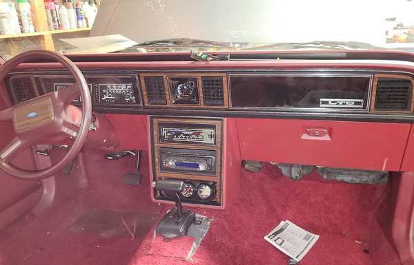 Installed the dash, replaced clock with tach. Replaced ashtray with tri-gauges. Installed deck. Reinstalled shifter after modding shift points to hang up the 1st-2nd and 2nd-Drive for the strip.