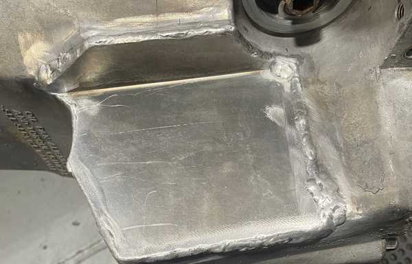 Oil pan had to get modified to fit next to the front diff. Oil pan had to get modified to fit next to the front diff.