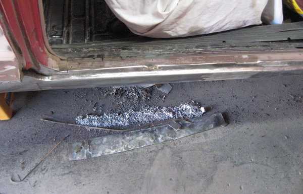 Rocker panel was caved in and filled with lead. Rocker panel was caved in and filled with lead.