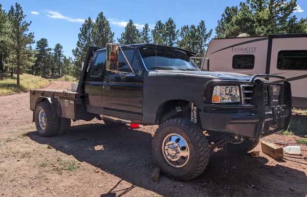 This is my 10 speed fummins. It's got axles from 2004 f350 and reverse shackle kit. Built most of the flatbed myself. It's got a 94 Cummins i built from the block up. 130710c Eaton fuller , divorced np205 and interior redone. Not a super show truck, just a cowboy truck that goes to work