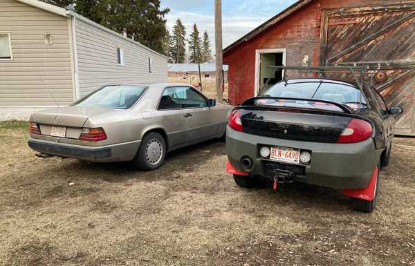 Parked next to my custom Mercedes in front of my shop, it’s a proud moment for me.