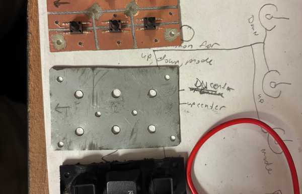 This is a prototype of a button panel remote control for the transmission. It's made from P keyboard parts and a crudely cut circuit board. This is a prototype of a button panel remote control for the transmission. It's made from P keyboard parts and a crudely cut circuit board.