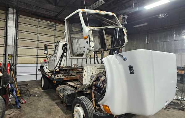 Removed exterior cab and other unnecessary parts, leaving the floorboard and firewall intact