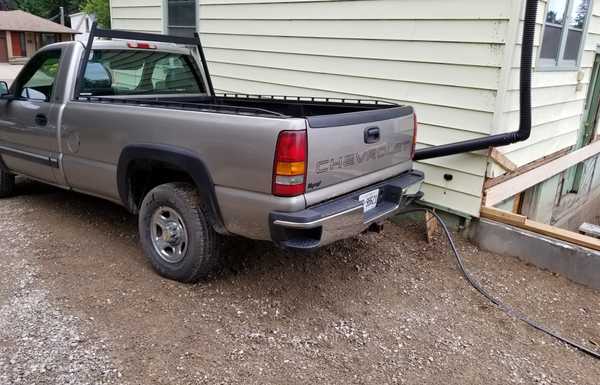 custom back rack with attached box rails.