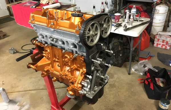 Current engine in car. This was before installed the first time. Same engine but has had a piston change. Current engine in car. This was before installed the first time. Same engine but has had a piston change.