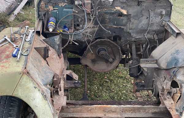 Empty engine bay, waiting for? Four-cylinder diesel, unsure of what I will be using yet.