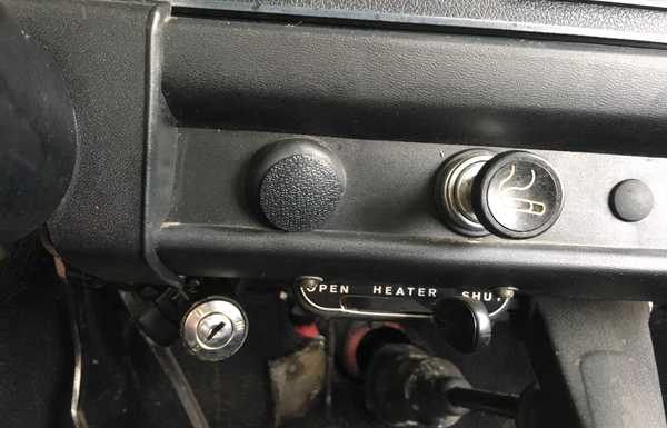 The shifter hangs from the dash