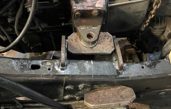 Driver's side engine mount welded to frame, and rubber puck style engine mounts in. It takes 2 part #M20310K4H. There is a spreader plate over the pucks that the actual engine mount bracket will bolt to. Driver's side engine mount welded to frame, and rubber puck style engine mounts in. It takes 2 part #M20310K4H. There is a spreader plate over the pucks that the actual engine mount bracket will bolt to.