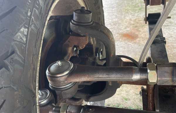 Jeep axles with modified knuckles for larger rotors and dual piston calipers for the added power.