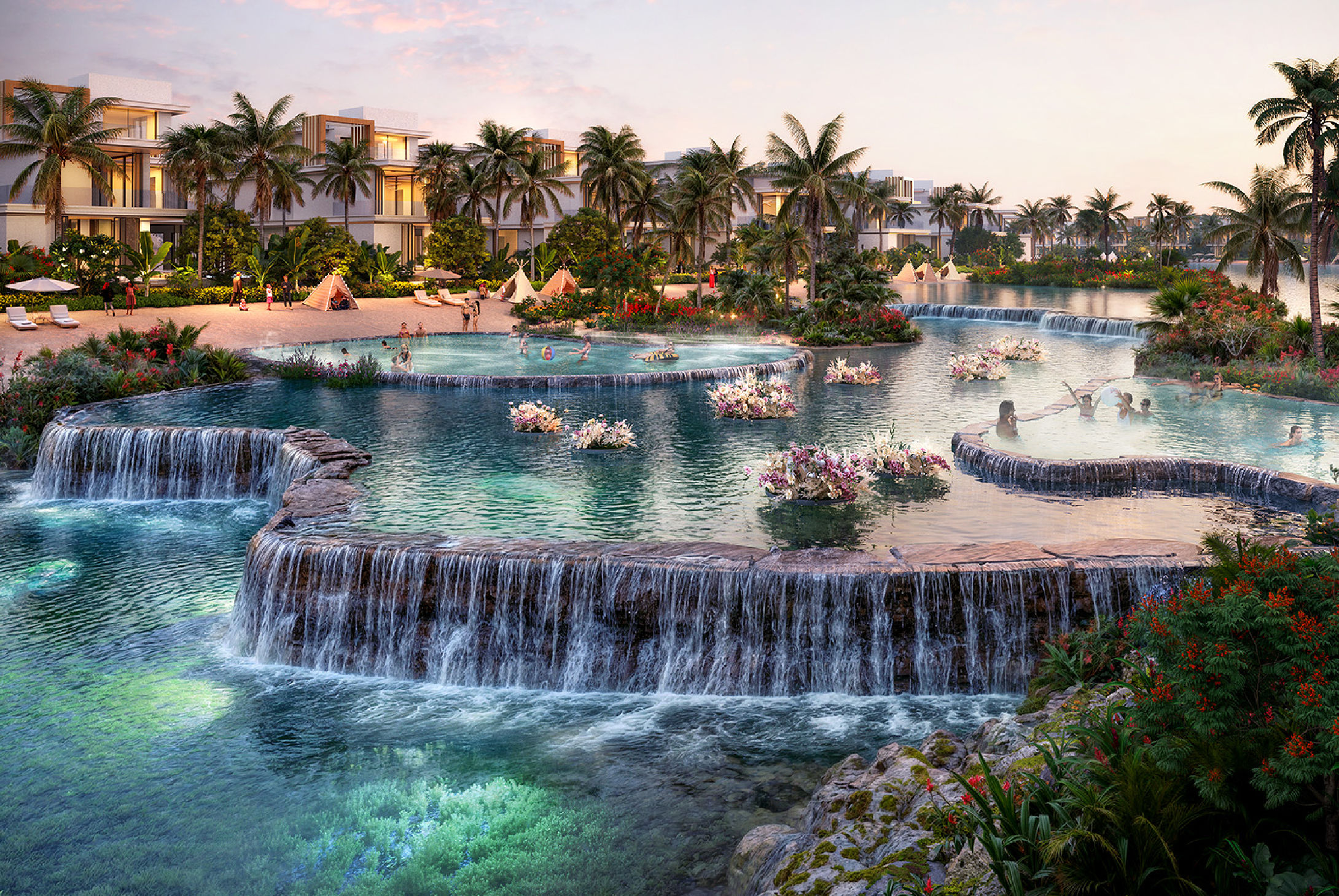 View of Yachtside Marina Residences at sunset with buildings, palm trees, and beach