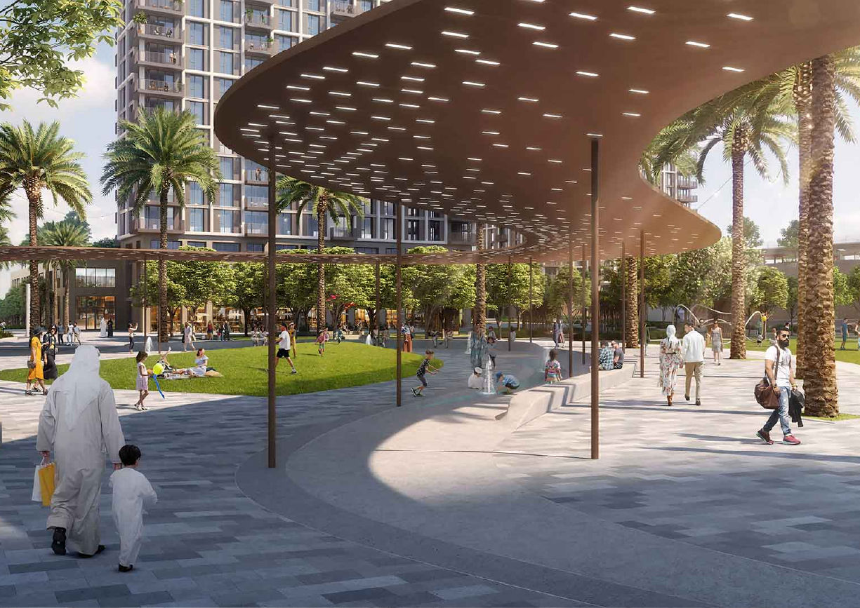 View of Yachtside Marina Residences at sunset with buildings, palm trees, and beach