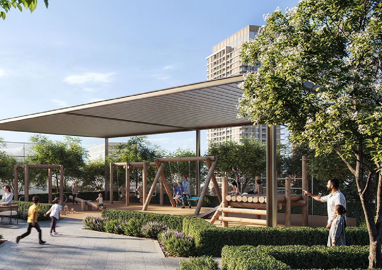 View of Yachtside Marina Residences at sunset with buildings, palm trees, and beach