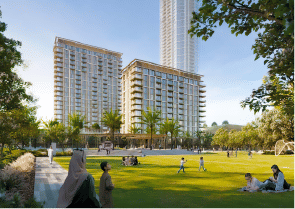 View of Yachtside Marina Residences at sunset with buildings, palm trees, and beach