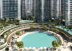View of Yachtside Marina Residences at sunset with buildings, palm trees, and beach