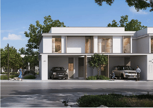 View of Yachtside Marina Residences at sunset with buildings, palm trees, and beach