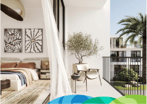 View of Yachtside Marina Residences at sunset with buildings, palm trees, and beach